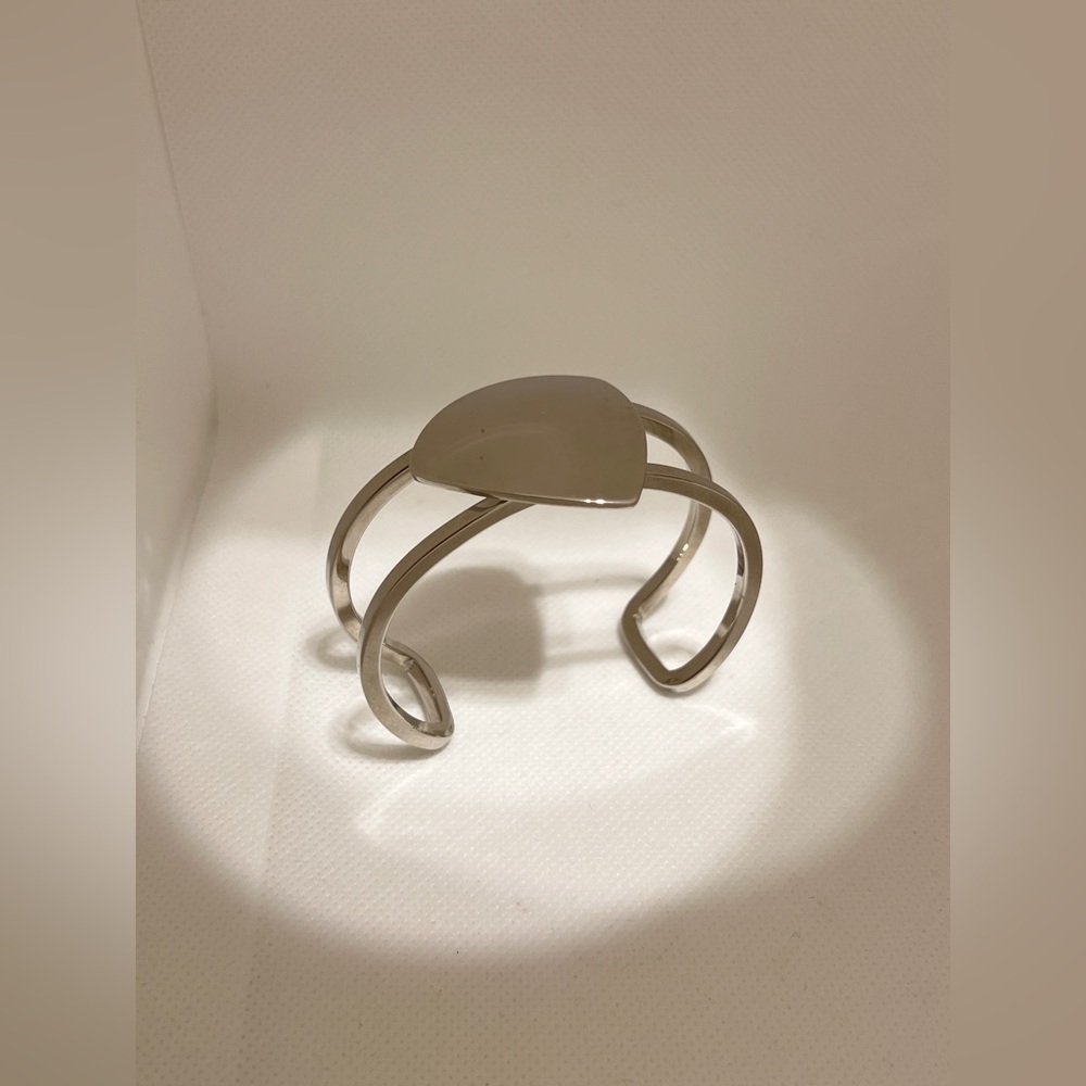 Silver tone cuff bracelet bangle